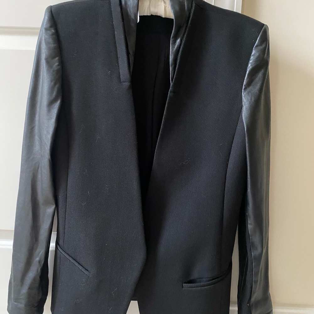 Helmut Lang Lambskin and Wool blazer with single button closure.